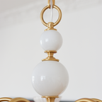 Novae Sleek Iron and Glass Pendant Light for Modern Bedrooms | Snurv