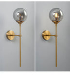 Glass Torch Wall Light in Brass | Knesse