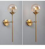Glass Torch Wall Light in Brass | Knesse