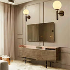 Kestrel Upright Milky Glass Ball LED Wall Sconce in Brushed Brass Finish, Mid-Century Modern Style | Knesse