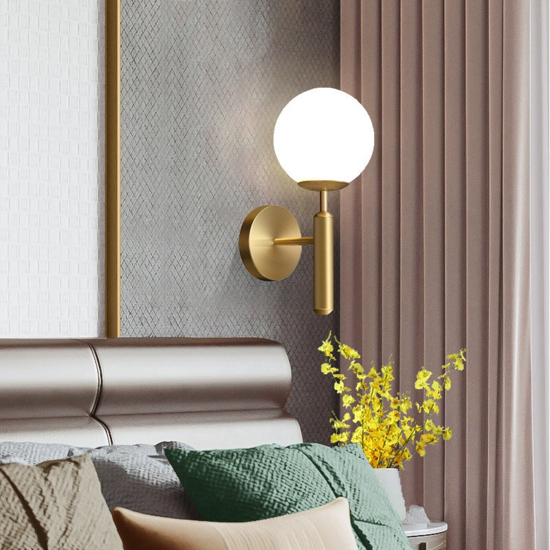 Kestrel Upright Milky Glass Ball LED Wall Sconce in Brushed Brass Finish, Mid-Century Modern Style | Knesse