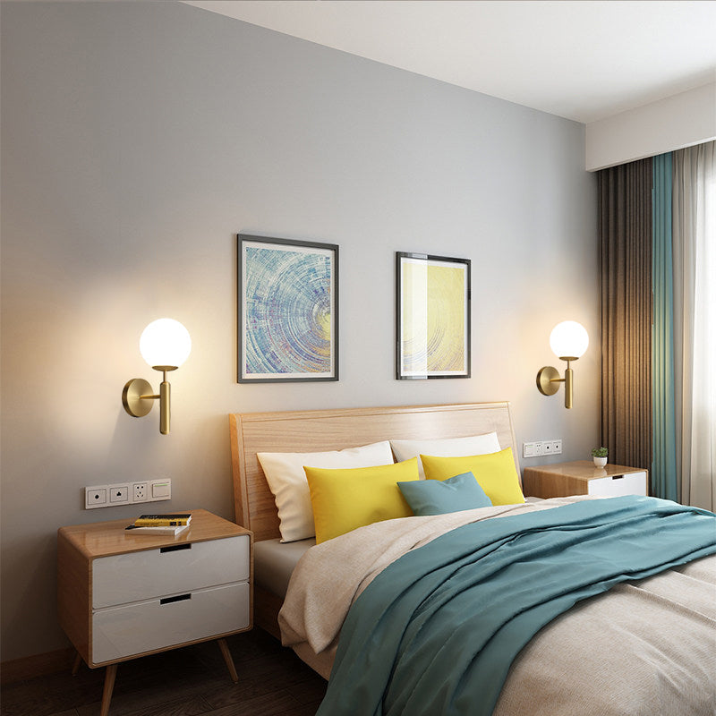 Kestrel Upright Milky Glass Ball LED Wall Sconce in Brushed Brass Finish, Mid-Century Modern Style | Knesse