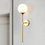 Glass Torch Wall Light in Brass | Knesse