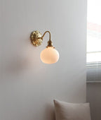 Lumiara | Ribbed Ceramic Globe Wall Sconce With Brushed Brass Carved Floral Detail, Bulb Included | Knesse