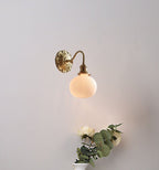 Lumiara | Ribbed Ceramic Globe Wall Sconce With Brushed Brass Carved Floral Detail, Bulb Included | Knesse