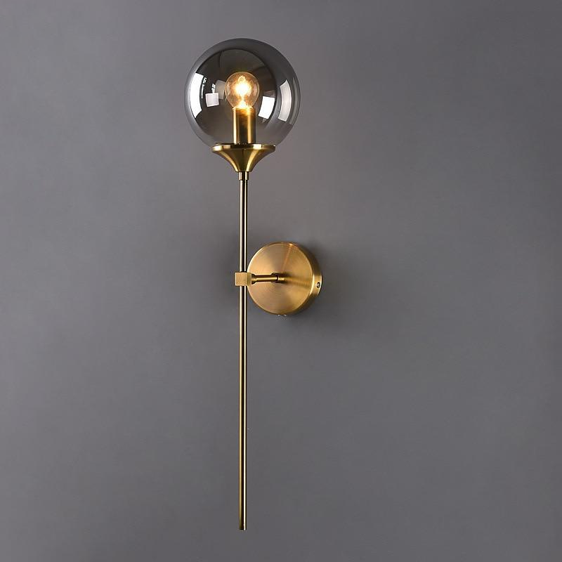 Glass Torch Wall Light in Brass | Knesse